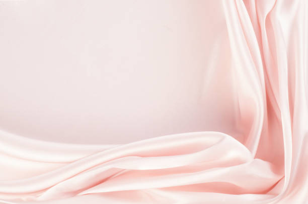 istock The texture of the silk fabric, soft pink 838209736