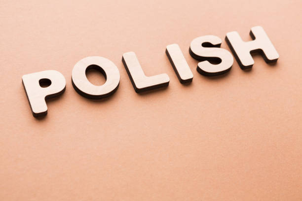 Word Polish on beige background. Foreign language learning, education concept