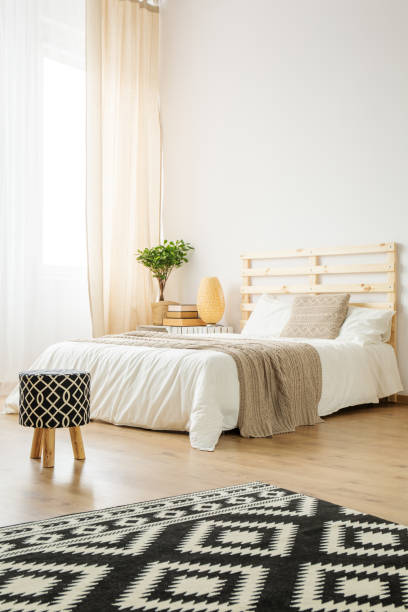 istock Bed in cozy bedroom 838217256