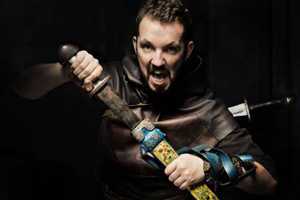 istock Viking warrior with sword over black background 838221300