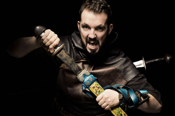 istock Viking warrior with sword over black background 838221368