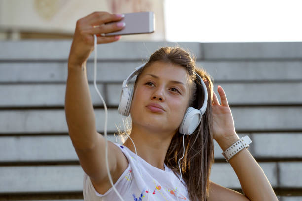 istock Jogger taking selfie at the stairs 838222384