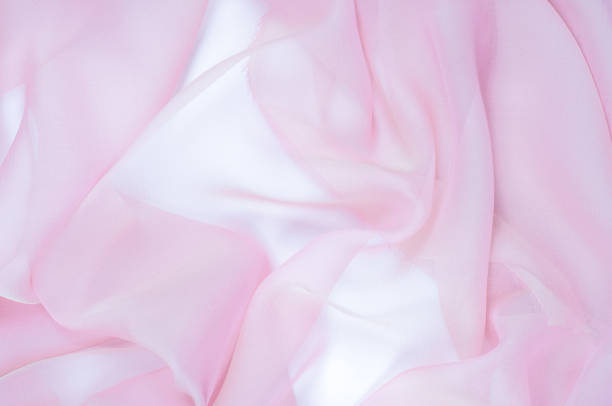 istock The texture of the silk fabric, soft pink 838229218