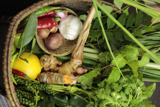 istock Variety of fresh asian herbs displayed in baskets 838230834