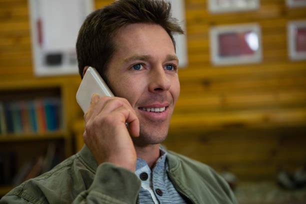 istock Man talking on smart phone at cafe 838237894