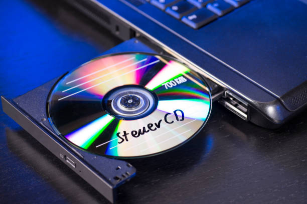 cd with the inscription "steuer cd" - computer software cd computer laptop imagens e fotografias de stock