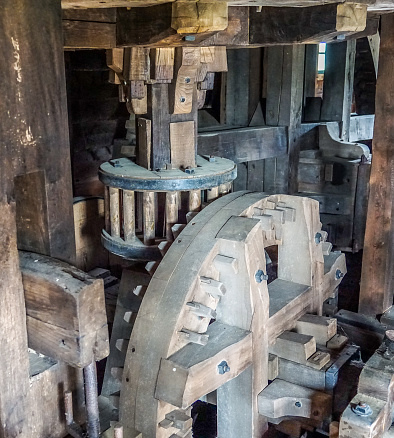 close-up of a wood made gear of an old windmill