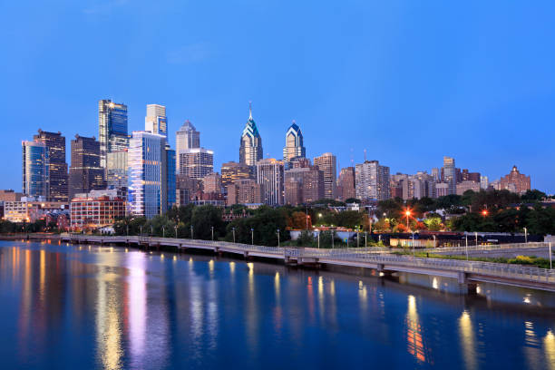 istock Philadelphia skyline illuminated and reflected into Schuylkill River at dusk 838258230