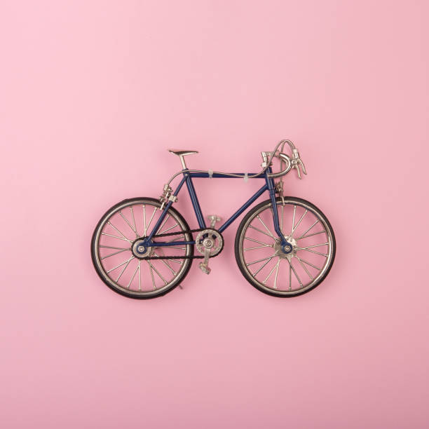 istock Sport concept - toy bicycles on pink background 838261776