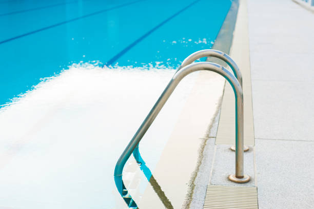 outdoor swimming pool with stair in a building