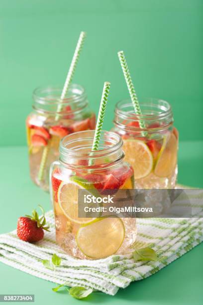 Refreshing Summer Lemonade With Strawberry And Lime In Mason Jar Stock Photo - Download Image Now