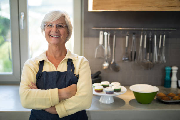 istock Senior women standing in the kitchen 838280372