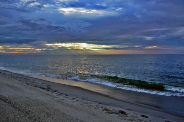 istock Serene Summer Sunrise Over Sandy Shores and Seas 838293476