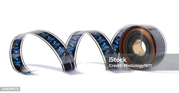 Film Reel Stretched Against White Background Stock Photo