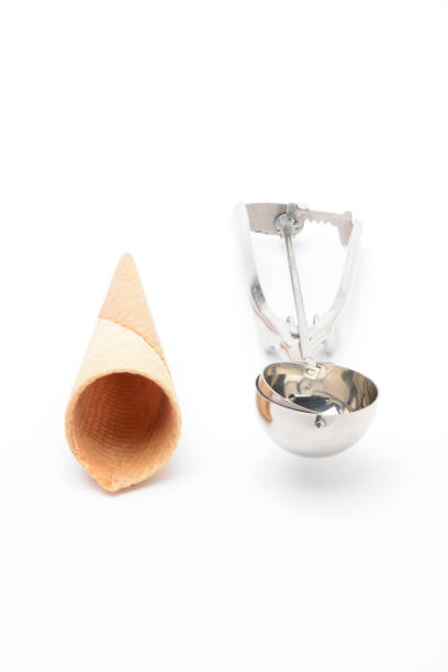 istock Wafer cone for ice cream and spoon for scooping ice cream balls 838309502