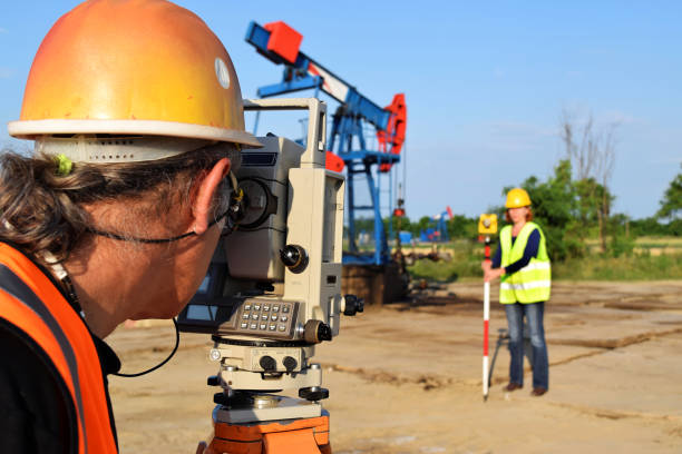 istock Two engineers working at crude oil field 838318856