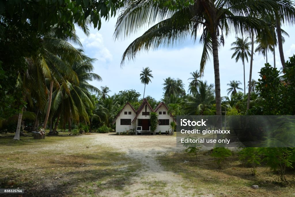 Mansion at Ao Khanom, Southern Thailand Mansion in the green lush, tropical vegetation at Ao Khanom, a pristine area in southern Thailand. 

 Blue Stock Photo