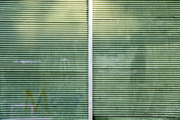 Flaked paint mettal shop shutter closed