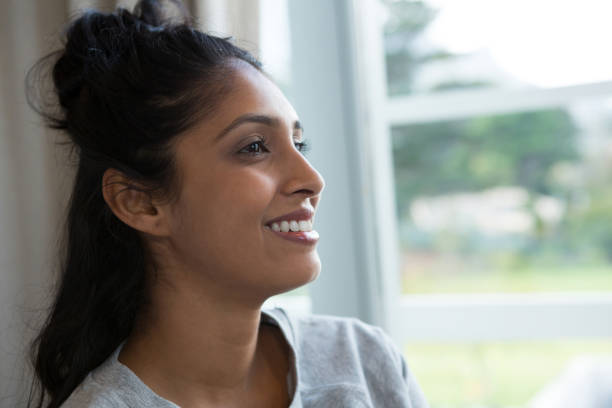 istock Smiling woman looking away 838336686