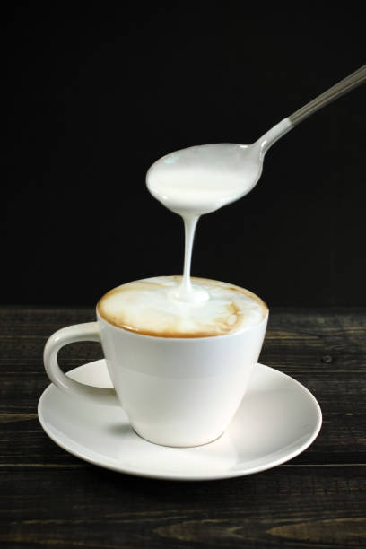 istock Hot Coffee Cappuccino and pouring milk 838356826
