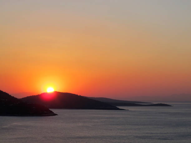 istock Beautiful seascape under red sky 838366036