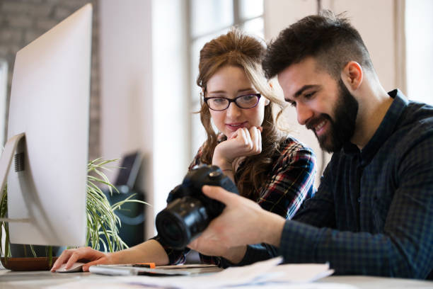 istock Picture of young attractive designers looking at camera 838370052