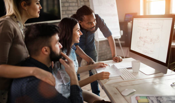 istock Group of young designers working as team 838376154