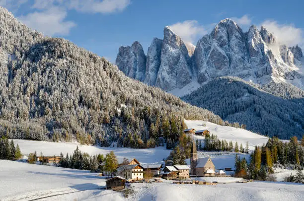 Photo of St. Magdalena village with Dolomites mountains in winter