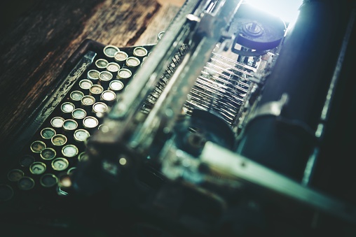 Aged Typewriting Machine Closeup Photo. Vintage Typewriter.