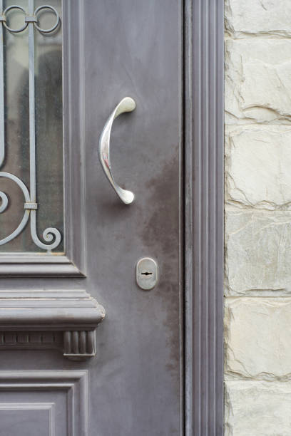 istock Modern style door handle on grey door. 838383340