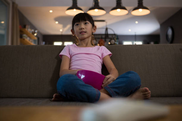 istock Girl relaxing on sofa at home 838386610