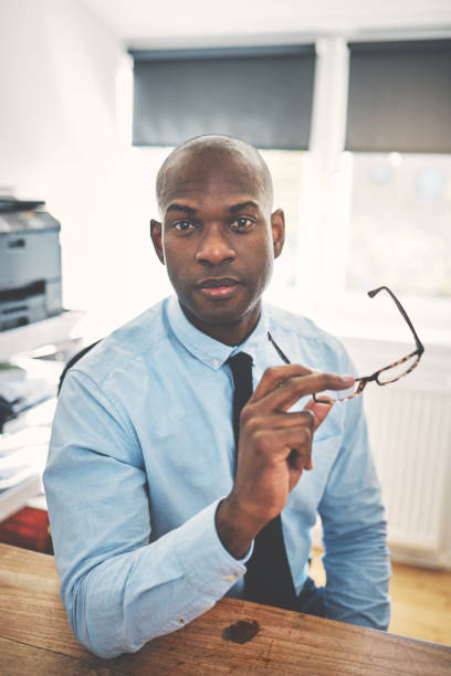 istock Confident and focused African businessman sitting in his 838390694