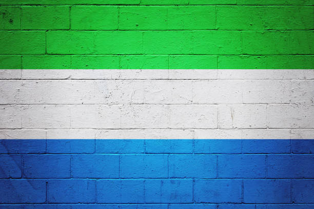 Flag of Sierra Leone painted on a brick wall.