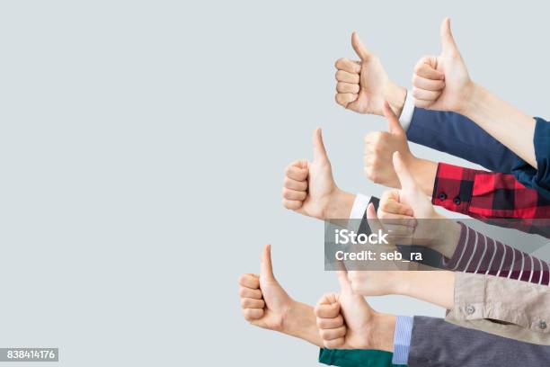 Hands Making Thumbs Up Stock Photo - Download Image Now - Thumbs Up, Congratulating, People