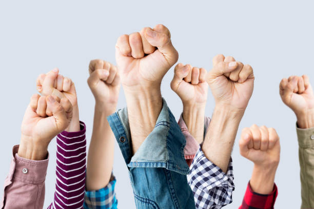 istock Group of fists raised in air 838416924