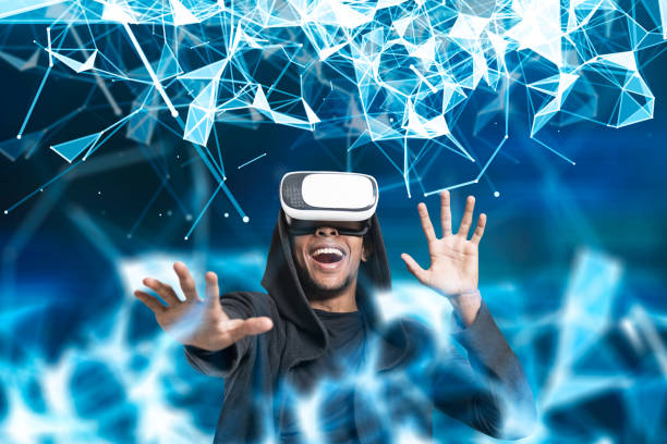 istock Smiling African man in VR glasses, blue polygons 838420380