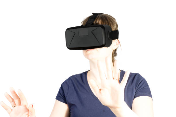istock Woman with virtual reality goggles. Studio shot, isolated on white background 838425004