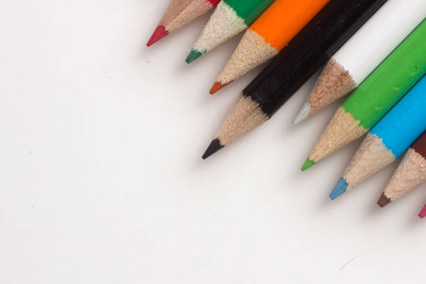 istock Close-up of a group of multicolored pencils on a white background 838425532