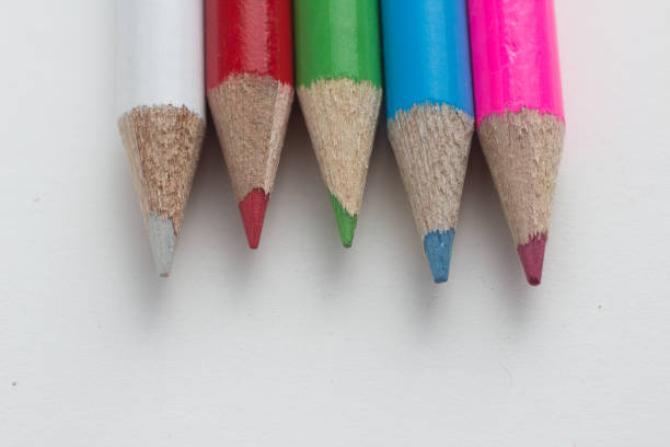 istock Close-up of a group of multicolored pencils on a white background 838425596