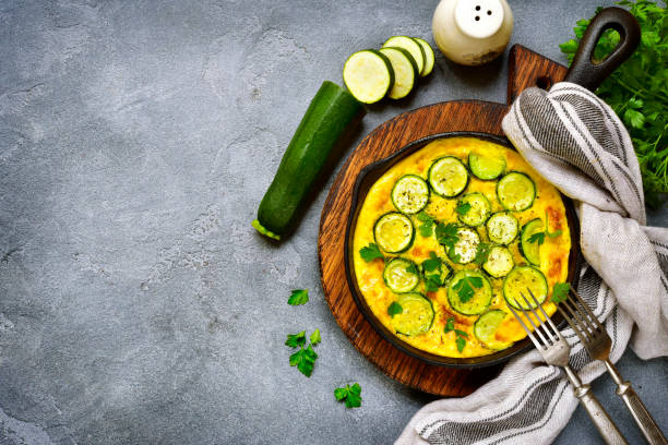 istock Oven baked omelette with zucchini in a cast iron pan 838431400
