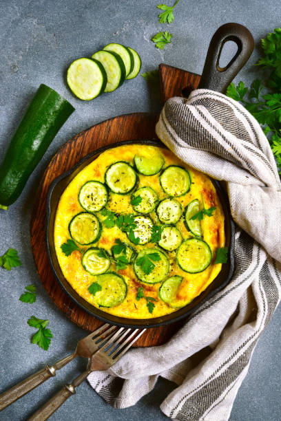 istock Oven baked omelette with zucchini in a cast iron pan 838431404