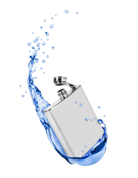 istock Stainless hip flask with fresh water splashes on white background 838432428