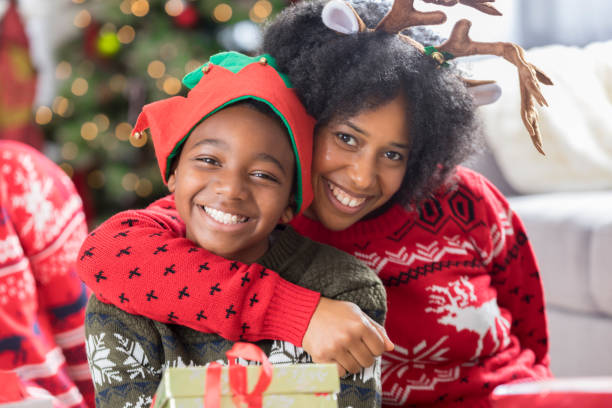 istock Loving single mother with her son on Christmas morning 838439844
