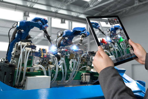 istock Industrial 4.0 , Augmented reality concept. Hand holding tablet with AR service , maintenance application and calling technician for check destroy part of smart machine in smart factory background 838450826