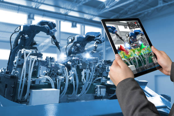 istock Industrial 4.0 , Augmented reality concept. Hand holding tablet with AR service , maintenance application and calling technician for check destroy part of smart machine in smart factory background 838450846