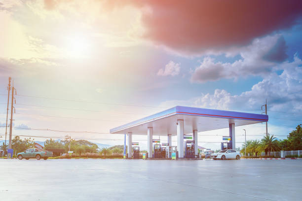 istock Gas station with clouds and blue sky 838454790