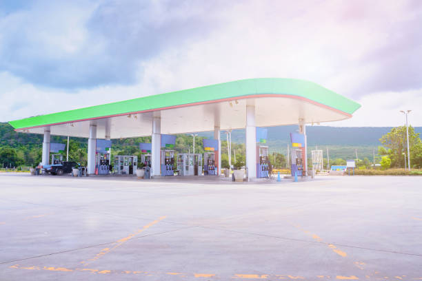 istock Gas fuel station with clouds in the sky and sun light 838454802