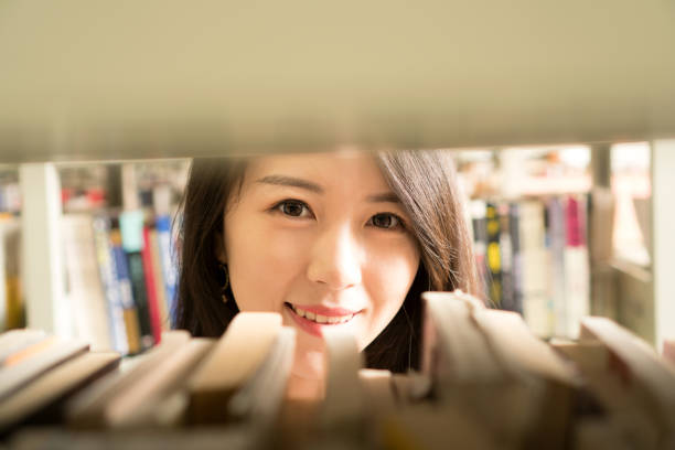 istock asian girl in library 838466994