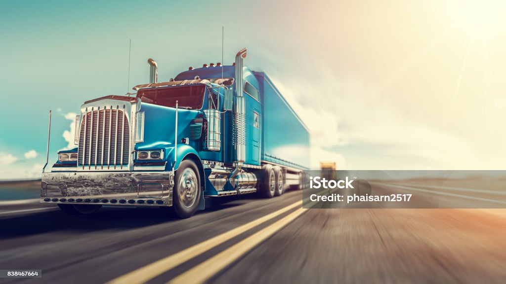 The truck runs on the highway. The truck runs on the highway with speed. 3d render and illustration. Semi-Truck Stock Photo