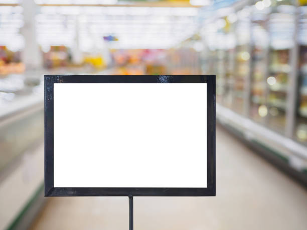 istock blank board with blur supermarket for background 838468532